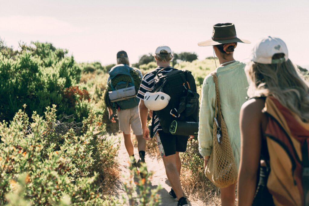 Group of youn people hiking in malaga